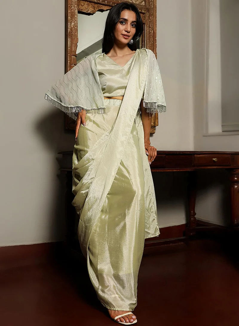  قصة Women's Sage Green Bijou Cape Pre-Draped Saree For Casual Wear | V-Neck | Cape Sleeves | 1 Piece Pre-Draped Saree Designed With Comfort Fit For Everyday Ethnic Wear